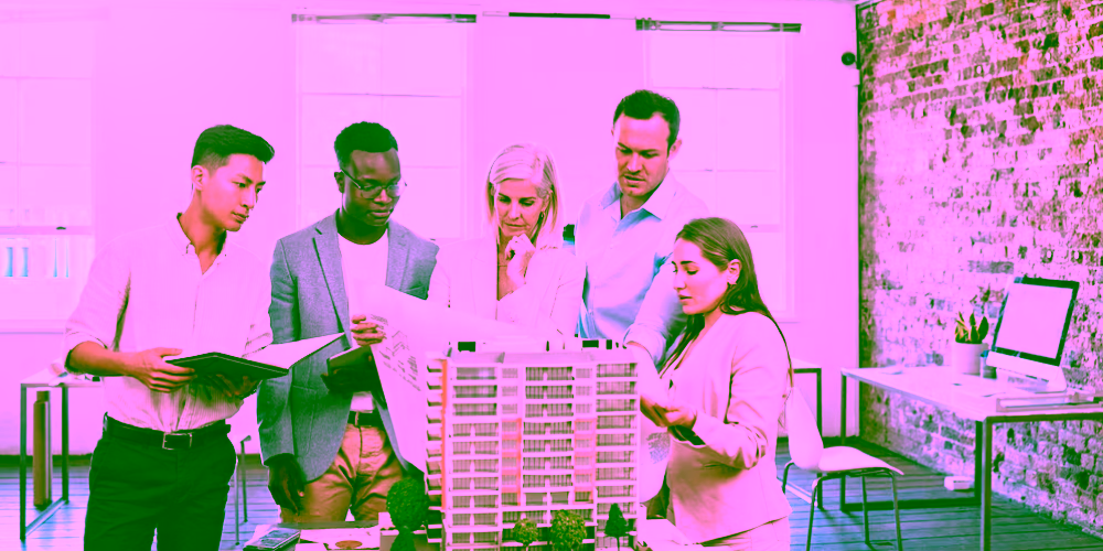 diverse-team-architects-working-building-model-together-inside-office-group-engineers-planning-reconstruction-design-project-apartment-block-with-blueprint-documents_590464-79991 diverse-team-architects-working-building-model-together-inside-office-group-engineers-planning-reconstruction-design-project-apartment-block-with-blueprint-documents_590464-79991